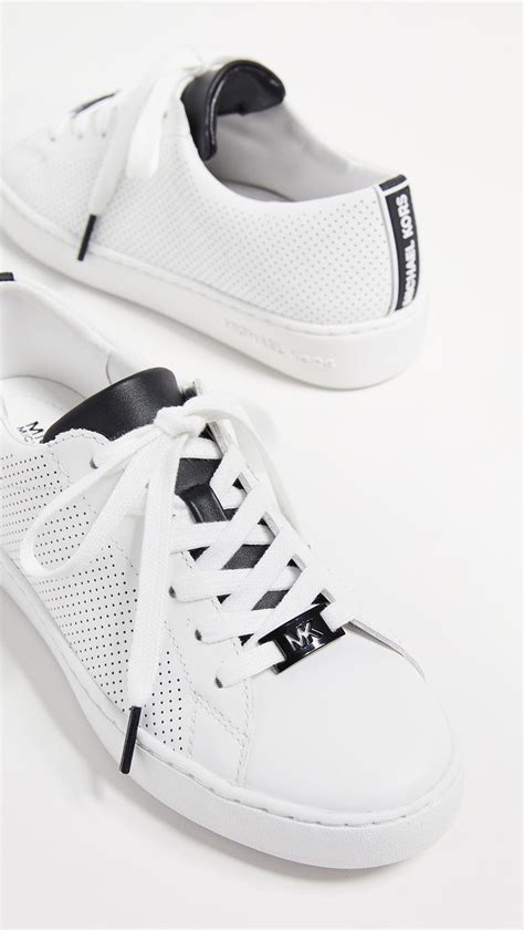 michael michael kors white sneakers rubber bottom|Michael Kors white booties.